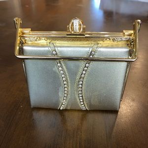 Silver purse with gold embellishments